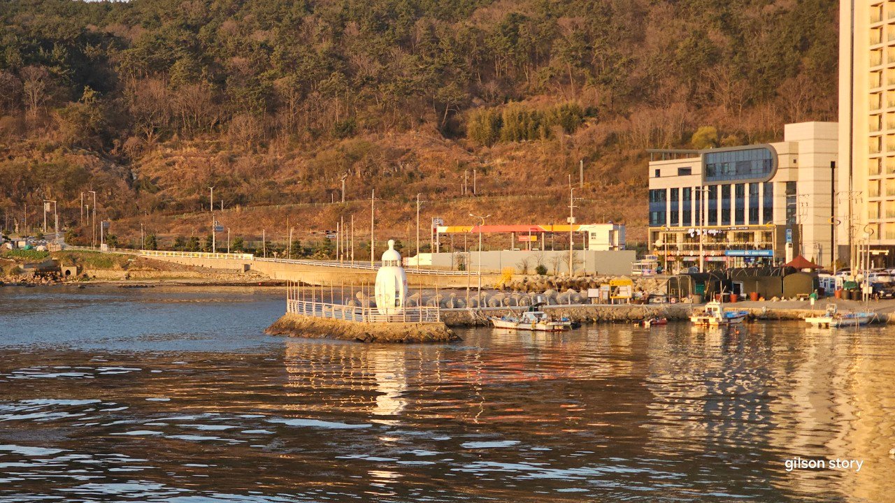 Baby bottle-shaped lighthouse at Seoam Village breakwater, Gijang, Busan