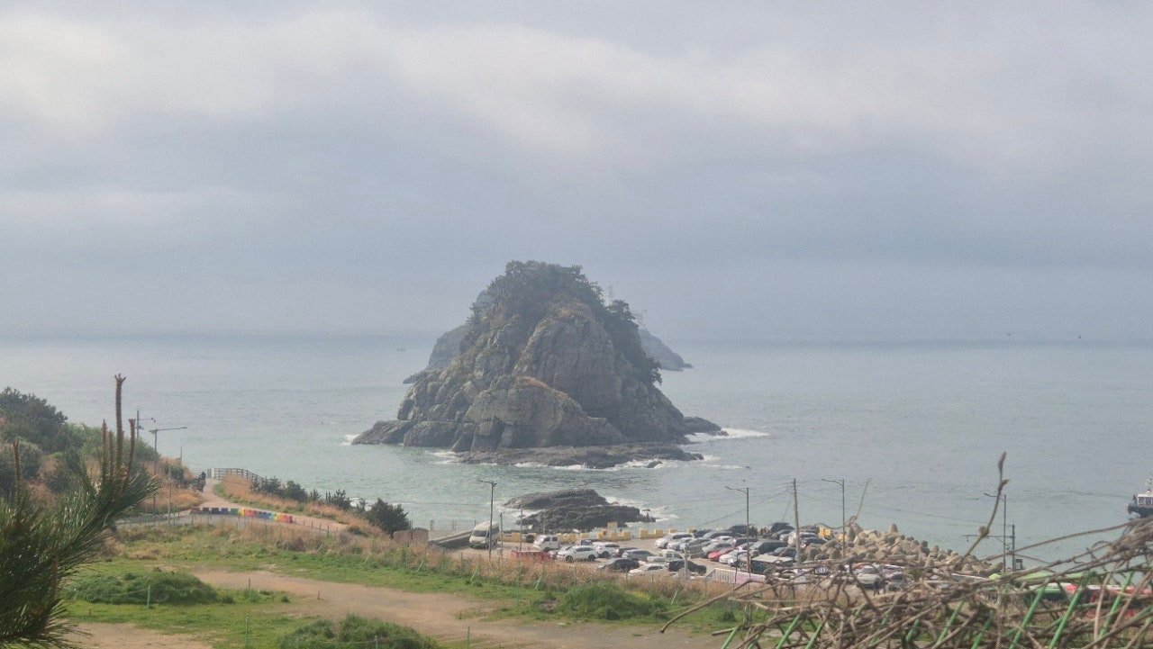 Oryukdo rock formation seen from the skywalk on an overcast morning, Busan