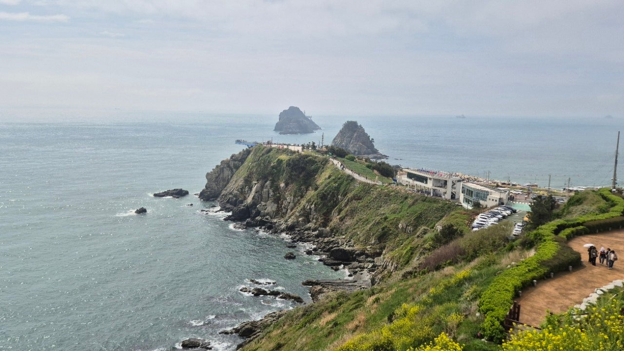 Oryukdo Skywalk cliff and coastal walking path with visitors, Busan